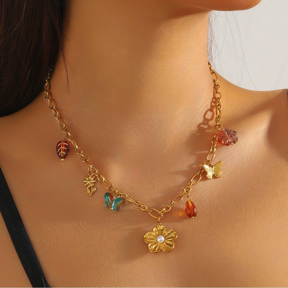 Charming Gold Necklace with Floral and Butterfly Accents - Picture 2 of 5